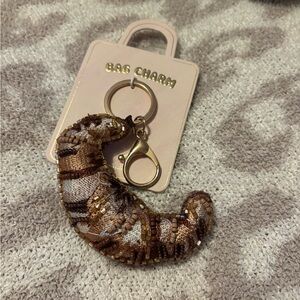 Anthropologie beaded Croissant bag charm